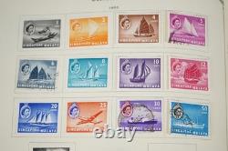 COLLECTION MONDIALE S-Z 1940s-1980s DE PLUS DE 3000 TIMBRES NEUFS ET USAGÉS DANS UN ALBUM SCOTT