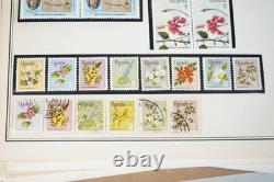 COLLECTION MONDIALE U-T ANNÉES 1910-1970 DE PLUS DE 800 TIMBRES NEUFS ET USAGÉS SUR PAGES D'ALBUM