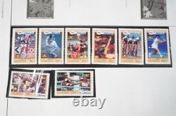 COLLECTION MONDIALE U-T ANNÉES 1910-1970 DE PLUS DE 800 TIMBRES NEUFS ET USAGÉS SUR PAGES D'ALBUM