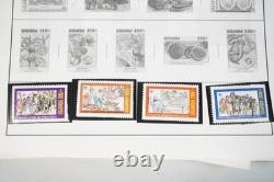 COLLECTION MONDIALE U-T ANNÉES 1910-1970 DE PLUS DE 800 TIMBRES NEUFS ET USAGÉS SUR PAGES D'ALBUM