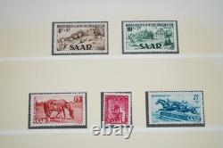 COLLECTION SAAR 1920-1950 DE PLUS DE 125 TIMBRES NEUFS ET USAGÉS DANS UN ALBUM LINDNER