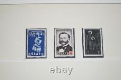 COLLECTION SAAR 1920-1950 DE PLUS DE 125 TIMBRES NEUFS ET USAGÉS DANS UN ALBUM LINDNER