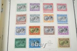 COLONIES BRITANNIQUES 1860s-1960s COLLECTION DE PLUS DE 1 150 TIMBRES NEUFS ET USAGÉS DANS UN ALBUM