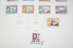 COLONIES BRITANNIQUES 1860s-1960s COLLECTION DE PLUS DE 1 150 TIMBRES NEUFS ET USAGÉS DANS UN ALBUM