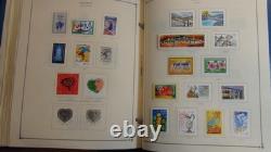 Collection France Stampsweis dans un album Scott International, est. 2870 timbres jusqu’en 2000