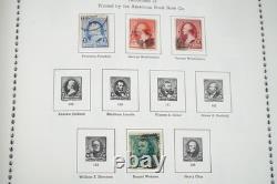 Collection américaine de 1857 aux années 1970 d’environ 1 000 timbres neufs et oblitérés dans un album Minkus