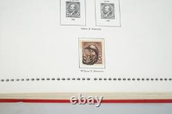 Collection américaine de 1857 aux années 1970 d’environ 1 000 timbres neufs et oblitérés dans un album Minkus