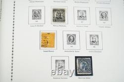 Collection américaine de 1857 aux années 1970 d’environ 1 000 timbres neufs et oblitérés dans un album Minkus