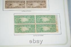 Collection américaine de plus de 200 timbres neufs des années 1920 à 1960, conservés sur des pages d’album