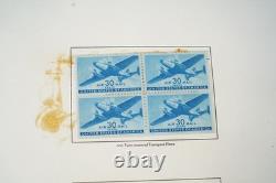 Collection américaine de plus de 200 timbres neufs des années 1920 à 1960, conservés sur des pages d’album