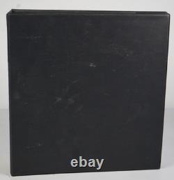 Collection américaine de timbres découpés et d'emballages de papeterie postale dans un album