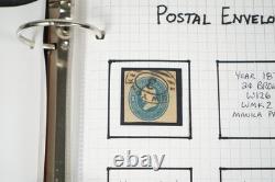 Collection américaine de timbres découpés et d'emballages de papeterie postale dans un album