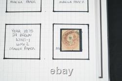 Collection américaine de timbres découpés et d'emballages de papeterie postale dans un album