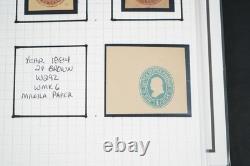 Collection américaine de timbres découpés et d'emballages de papeterie postale dans un album