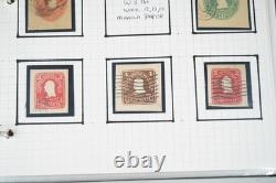 Collection américaine de timbres découpés et d'emballages de papeterie postale dans un album