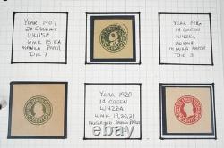 Collection américaine de timbres découpés et d'emballages de papeterie postale dans un album
