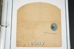 Collection américaine de timbres découpés et d'emballages de papeterie postale dans un album