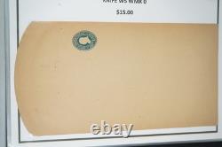 Collection américaine de timbres découpés et d'emballages de papeterie postale dans un album