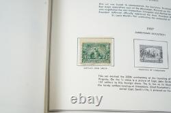 Collection américaine des années 1890-1970 de plus de 700 timbres neufs et oblitérés, conservés dans un album Harris