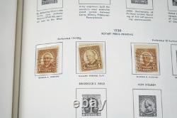 Collection américaine des années 1890-1970 de plus de 700 timbres neufs et oblitérés, conservés dans un album Harris