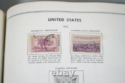Collection américaine des années 1890-1970 de plus de 700 timbres neufs et oblitérés, conservés dans un album Harris