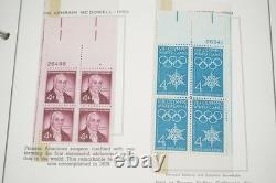 Collection américaine des années 1950-1960 de près de 200 blocs de plaques neufs, conservée dans un album Minkus
