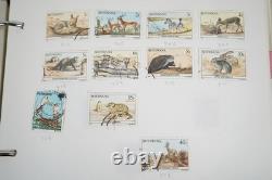Collection britannique d'Afrique de plus de 1 900 timbres neufs et usagés stockés dans un album