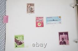 Collection britannique d'Afrique de plus de 1 900 timbres neufs et usagés stockés dans un album