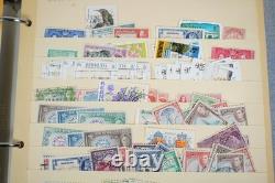 Collection britannique du Commonwealth de plus de 1 700 timbres utilisés, rangée dans un album