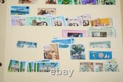 Collection britannique du Commonwealth de plus de 1 700 timbres utilisés, rangée dans un album