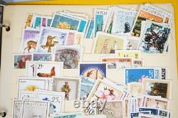 Collection d'Albanie de 825+ timbres neufs et utilisés dans un album sur des pages de stock