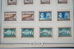 Collection d'Indonésie de 140 timbres et 4 feuillets dans un album spécialisé et pages d'album