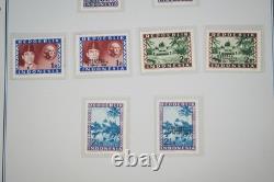 Collection d'Indonésie de 140 timbres et 4 feuillets dans un album spécialisé et pages d'album