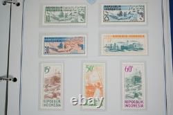 Collection d'Indonésie de 140 timbres et 4 feuillets dans un album spécialisé et pages d'album