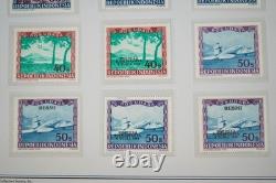 Collection d'Indonésie de 140 timbres et 4 feuillets dans un album spécialisé et pages d'album