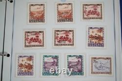 Collection d'Indonésie de 140 timbres et 4 feuillets dans un album spécialisé et pages d'album