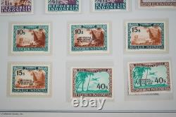 Collection d'Indonésie de 140 timbres et 4 feuillets dans un album spécialisé et pages d'album