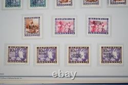 Collection d'Indonésie de 140 timbres et 4 feuillets dans un album spécialisé et pages d'album