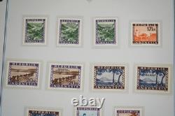 Collection d'Indonésie de 140 timbres et 4 feuillets dans un album spécialisé et pages d'album