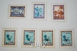 Collection d'Indonésie de 140 timbres et 4 feuillets dans un album spécialisé et pages d'album
