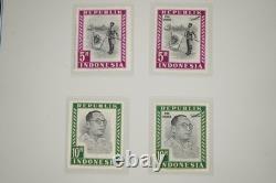 Collection d'Indonésie de 140 timbres et 4 feuillets dans un album spécialisé et pages d'album