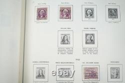Collection de 1000+ timbres neufs et oblitérés des États-Unis 1893-1989 stockée dans un album Harris