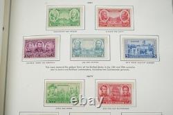 Collection de 1000+ timbres neufs et oblitérés des États-Unis 1893-1989 stockée dans un album Harris