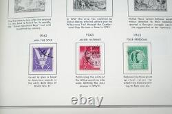 Collection de 1000+ timbres neufs et oblitérés des États-Unis 1893-1989 stockée dans un album Harris