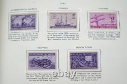 Collection de 1000+ timbres neufs et oblitérés des États-Unis 1893-1989 stockée dans un album Harris
