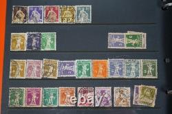 Collection de 2 300+ timbres de Suisse neufs et utilisés sur pages de stock dans un album