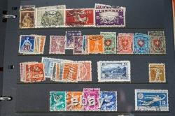 Collection de 2 300+ timbres de Suisse neufs et utilisés sur pages de stock dans un album