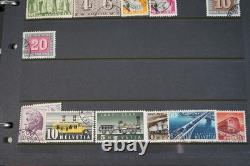 Collection de 2 300+ timbres de Suisse neufs et utilisés sur pages de stock dans un album