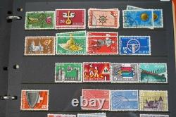 Collection de 2 300+ timbres de Suisse neufs et utilisés sur pages de stock dans un album