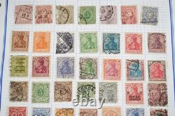 Collection de 2 400+ timbres d'Allemagne neufs et utilisés rangés dans un album